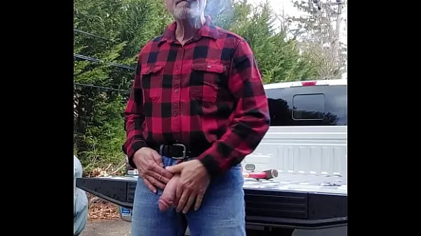 Oglądaj Lumberjack type guy finishes up after cutting woodnowy kanał